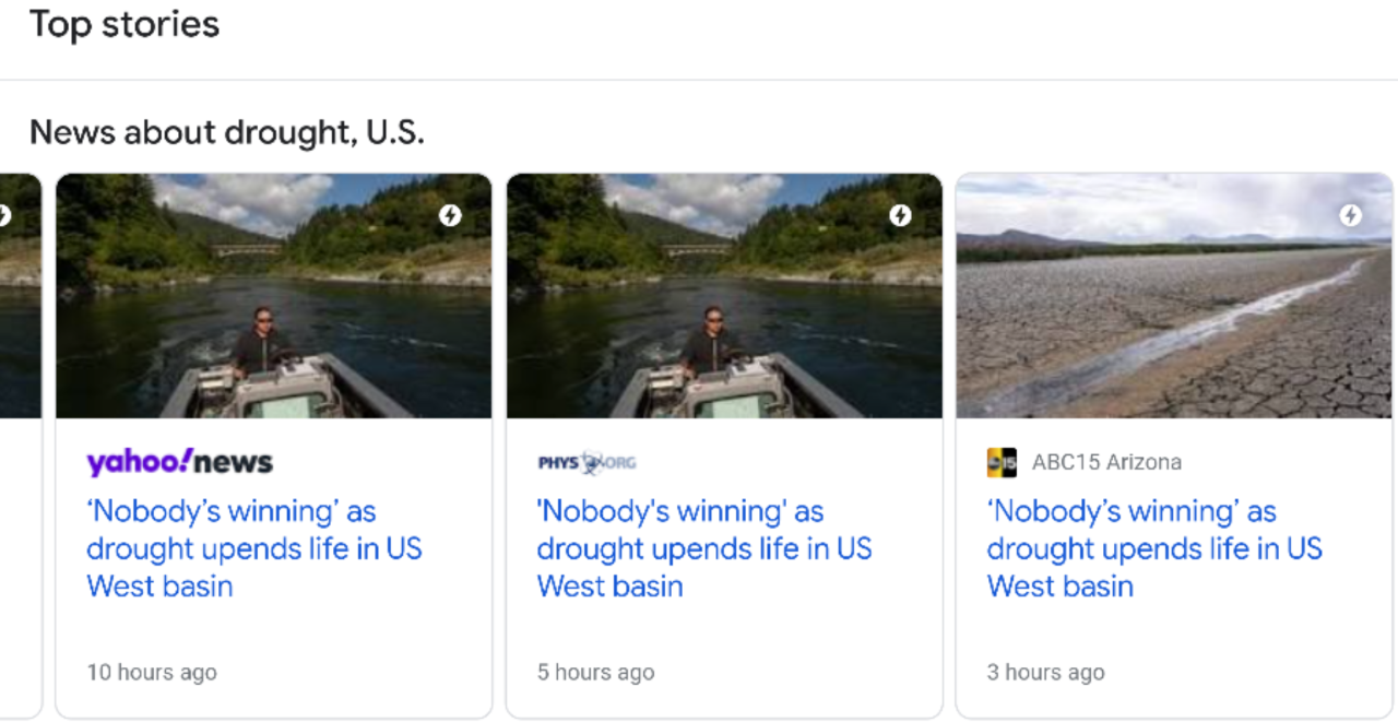 Screengrab of top stories carousel that contains three tiles that all contain links to the same article.